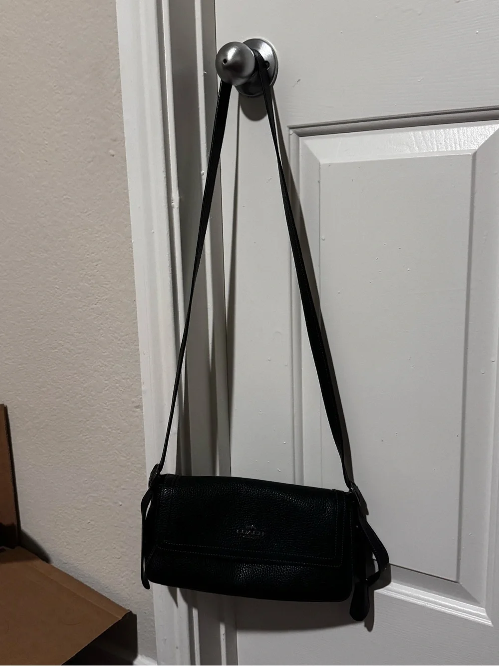 Coach compact pebbled